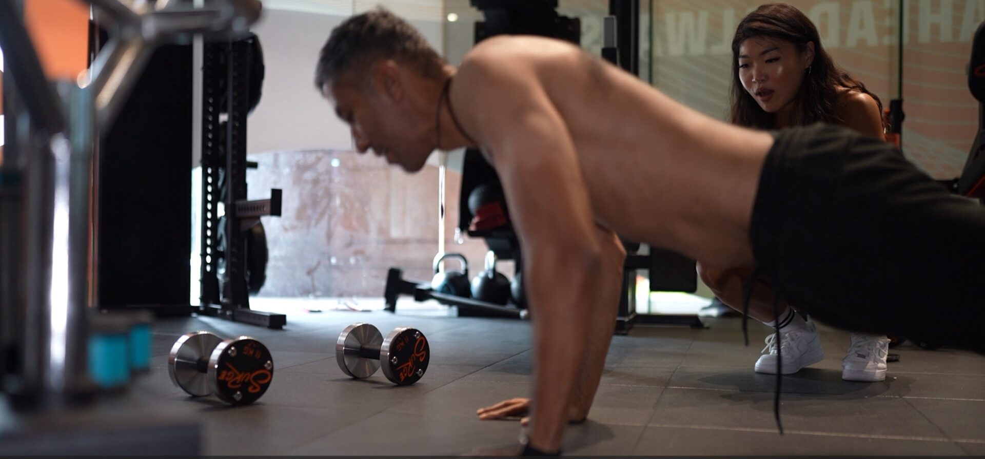 Aneez Ahmad | Best Personal Trainer Fitness Gym In Singapore | Surge PT: Strength & Results Aneez with iris | Best Personal Training Fitness Gym Singapore | Surge PT: Strength & Results